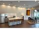 Entertaining kitchenette with modern appliances and a large island with barstool seating at 870 Inman Village Ne Pkwy # 229, Atlanta, GA 30307