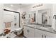 Elegant bathroom with double vanity, granite countertop, walk-in shower, and stylish fixtures at 99 Oxford Ln, Kingston, GA 30145