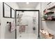 Clean bathroom with a bright walk-in shower, a rainfall shower head, and modern decor at 99 Oxford Ln, Kingston, GA 30145