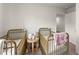 Bright bedroom with two cribs, round table and a pleasant view at 99 Oxford Ln, Kingston, GA 30145