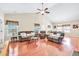 Spacious living room with hardwood floors, vaulted ceilings, and plenty of natural light at 2318 Chancery Mill Ln, Buford, GA 30519