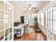 Bright home office with hardwood floors, lots of natural light, and a relaxing ambiance at 2318 Chancery Mill Ln, Buford, GA 30519