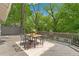 Inviting deck area, with a table and chairs, perfect for enjoying the outdoor surroundings at 291 Elmira Ne Pl, Atlanta, GA 30307