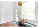 Bright entryway with a bench, pillows and a large window for lots of natural light at 291 Elmira Ne Pl, Atlanta, GA 30307