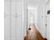 Hallway with hardwood floors and white walls at 291 Elmira Ne Pl, Atlanta, GA 30307