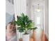 Hallway with hardwood floors, white walls, and a hanging pendant light at 291 Elmira Ne Pl, Atlanta, GA 30307