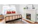 Bedroom showcasing a fireplace and large windows for natural light at 291 Elmira Ne Pl, Atlanta, GA 30307