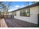 Wide dark back deck for entertaining at 5570 Deerfield Nw Pl, Kennesaw, GA 30144