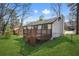 Backyard view of the house and the back deck at 5570 Deerfield Nw Pl, Kennesaw, GA 30144