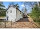 Backyard showing deck, siding, and door to the basement at 5570 Deerfield Nw Pl, Kennesaw, GA 30144