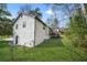 Side view of backyard with two-level back deck at 5570 Deerfield Nw Pl, Kennesaw, GA 30144