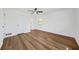 Cozy bedroom featuring wood-look floors and a ceiling fan at 5570 Deerfield Nw Pl, Kennesaw, GA 30144