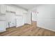 Spacious kitchen provides access to the main living area at 5570 Deerfield Nw Pl, Kennesaw, GA 30144