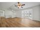 View of the open floor plan living room with a bay window at 5570 Deerfield Nw Pl, Kennesaw, GA 30144