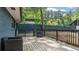 Inviting backyard deck with outdoor furniture, perfect for relaxation and entertaining at 715 Wood Valley Rd, Mableton, GA 30126