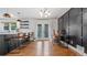Modern kitchen open to the dining area, featuring stainless steel appliances and sleek countertops at 715 Wood Valley Rd, Mableton, GA 30126