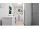 This Laundry Room features modern appliances and plenty of storage space at 715 Wood Valley Rd, Mableton, GA 30126