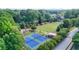 Aerial view of park with tennis court, playgrounds, and green space at 2186 Park Terrace, College Park, GA 30337