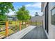 Outdoor balcony overlooking serene greenery, with modern railings and spacious area at 2186 Park Terrace, College Park, GA 30337