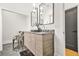 Elegant bathroom with double vanity, marble countertops, and modern fixtures at 2186 Park Terrace, College Park, GA 30337