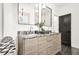 Elegant bathroom featuring a double vanity, marble countertops, and stylish decor at 2186 Park Terrace, College Park, GA 30337