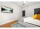 Spacious bedroom with wooden floors, a TV, and natural light at 2186 Park Terrace, College Park, GA 30337