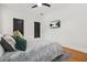 Bedroom features wood floors, a TV, and modern decor at 2186 Park Terrace, College Park, GA 30337