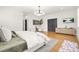 Spacious bedroom featuring hardwood floors, modern decor, and ample natural light at 2186 Park Terrace, College Park, GA 30337