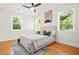 Bedroom featuring natural light, wood floors, and a patterned rug at 2186 Park Terrace, College Park, GA 30337
