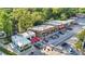 Aerial view of a vibrant commercial district with a variety of shops, restaurants, and street parking at 2186 Park Terrace, College Park, GA 30337