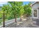 Spacious deck featuring a metal railing and view of the surrounding landscape at 2186 Park Terrace, College Park, GA 30337