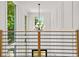 A bright foyer showcasing high ceilings, an elegant chandelier, and modern design at 2186 Park Terrace, College Park, GA 30337