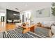 Open-concept living room with hardwood floors and contemporary decor at 2186 Park Terrace, College Park, GA 30337