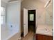 Bright bathroom featuring a combo tub and shower with a vanity sink at 2429 Wood Bend Ln, Riverdale, GA 30296