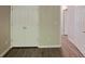 Spacious bedroom with double closet doors and wood-look flooring at 2429 Wood Bend Ln, Riverdale, GA 30296