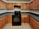 Well-equipped kitchen with stainless steel appliances and ample cabinet space at 2429 Wood Bend Ln, Riverdale, GA 30296