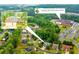Aerial view of the home near Puckett's Mill Elementary School, set amidst lush greenery and a friendly neighborhood at 3016 Levinshire Way, Dacula, GA 30019