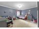 Bedroom with colorful decor, carpet flooring, and plenty of space for playing at 3016 Levinshire Way, Dacula, GA 30019