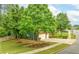 Exterior showcasing lawn, landscaping, and a two-car garage at 3016 Levinshire Way, Dacula, GA 30019