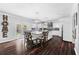 Bright open kitchen and breakfast area with center island and seating at 3016 Levinshire Way, Dacula, GA 30019