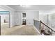 Second floor landing offering great views of the interior, natural light, and access to several rooms at 3016 Levinshire Way, Dacula, GA 30019