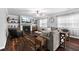 Comfortable Gathering room with a cozy fireplace, built-in shelves, and hardwood floors at 3016 Levinshire Way, Dacula, GA 30019