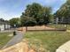 Community dog park with secure fencing, landscaping, and pet-friendly amenities at 1150 Collier Nw Rd # 25D, Atlanta, GA 30318