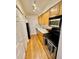 Well-lit kitchen with stainless steel appliances, stylish backsplash, and ample cabinet space at 1150 Collier Nw Rd # 25D, Atlanta, GA 30318