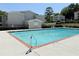 Outdoor community pool featuring clean, refreshing water and surrounding landscaping at 1150 Collier Nw Rd # 25D, Atlanta, GA 30318