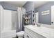 This bathroom features a shower/tub combo, a stylish vanity with ample storage, and a clean, modern design at 2102 Braswell Ln, Loganville, GA 30052
