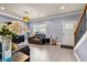 Inviting foyer with stairs and well-lit living area with contemporary decor at 2102 Braswell Ln, Loganville, GA 30052