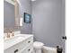 Compact bathroom with white vanity, bronze fixtures and simple decor at 2102 Braswell Ln, Loganville, GA 30052