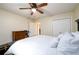 Well-lit bedroom featuring double closets and carpet flooring at 2804 Dunnington Cir, Chamblee, GA 30341