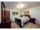 Cozy bedroom with carpeted floors and traditional furnishings at 2804 Dunnington Cir, Chamblee, GA 30341